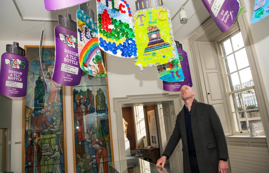 Paul O'Connell looks up at 'Design A TLC Bottle' Competition entries